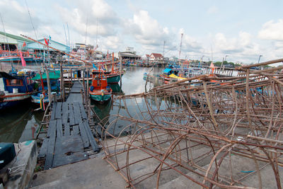 Boats moored at harbor