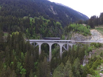 Arch bridge over river