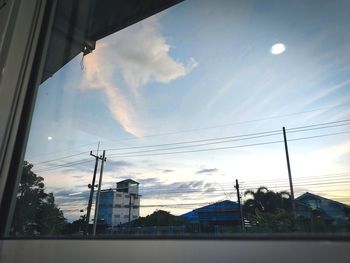 Low angle view of silhouette buildings against sky during sunset