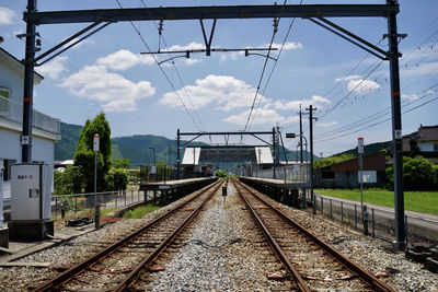 Railroad tracks against sky