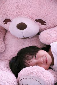 Portrait of cute baby sleeping on bed