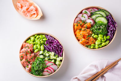 Vegan poke bowl with plant based seafood, salmon and tuna. food to reduce carbon footprint.