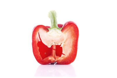 Close-up of red bell pepper against white background