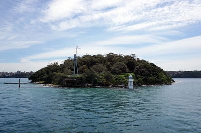 Boat sailing in sea against sky