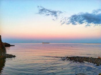 Scenic view of sea at sunset