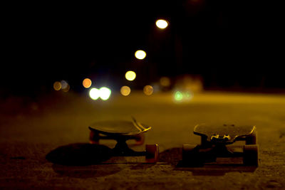 Close-up of skateboards at night