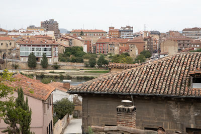 High angle view of residential buildings against sky