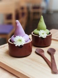 Close-up of flowers in bowl on table