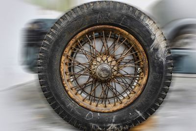 Close-up of wheel against black background