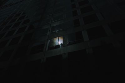 Reflection of moon on building at night