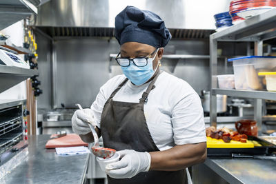 Cook preparing to tomato dishes