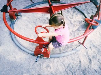 Girl playing in playground