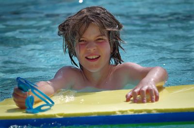 Young boy in pool