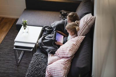 Girls using digital tablet