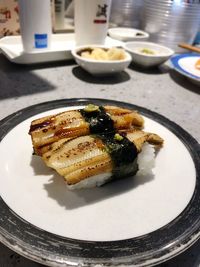 High angle view of fish served in plate on table