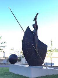 Close-up of statue against the sky