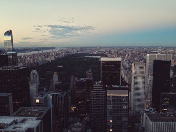 Aerial view of city at sunset