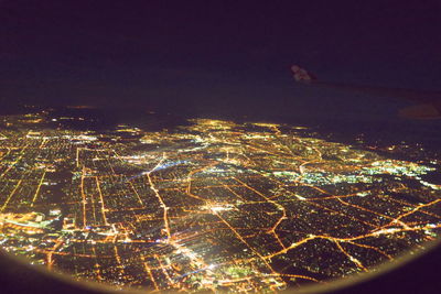 Aerial view of city at night