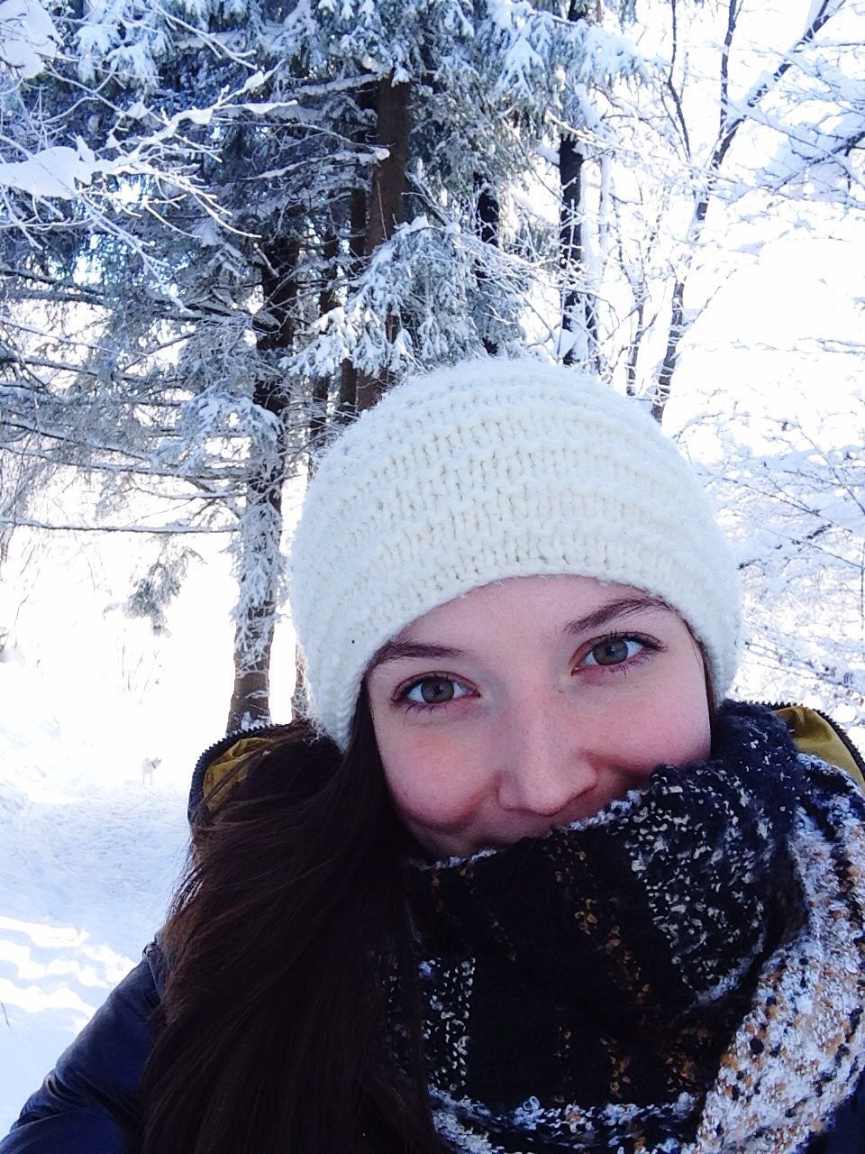 winter, cold temperature, headshot, snow, lifestyles, leisure activity, young adult, portrait, looking at camera, person, front view, season, tree, warm clothing, smiling, covering, young women, day