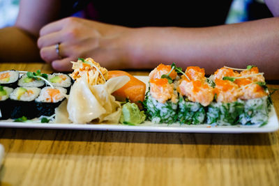 Close-up of sushi served on table