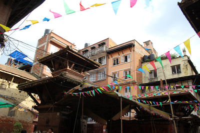 Low angle view of buildings against sky