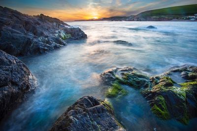 Scenic view of sea during sunset