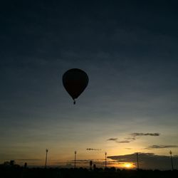 Low angle view of hot air balloon against sky during sunset