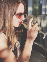 Portrait of a woman drinking 