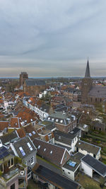 Beautiful view from above, from drone to orange, tiled roofs of houses. city of wijk bij duurstede. 
