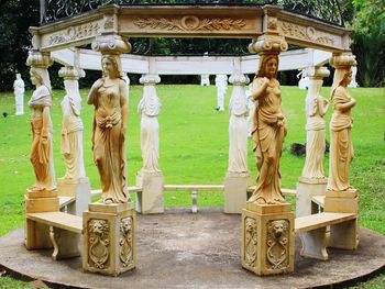 Statues in temple outside building