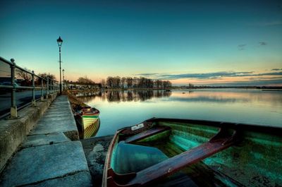 Pier over lake against sky