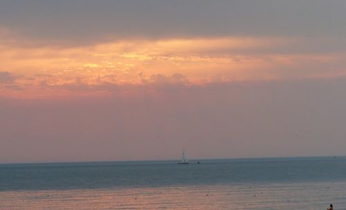 Scenic view of sea at sunset