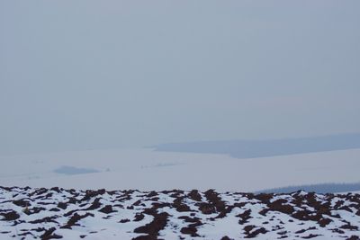 Scenic view of frozen sea against clear sky