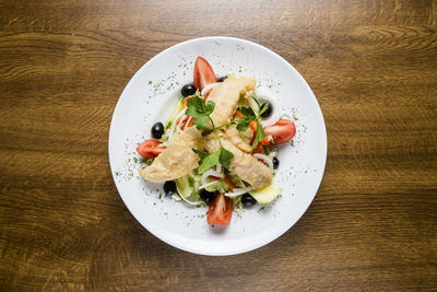 High angle view of salad in plate on table