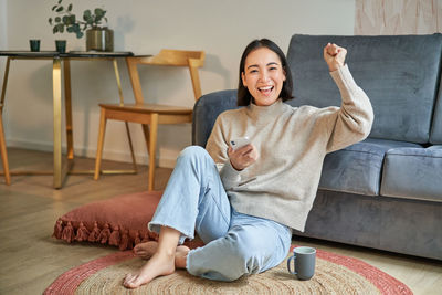 Young woman using mobile phone