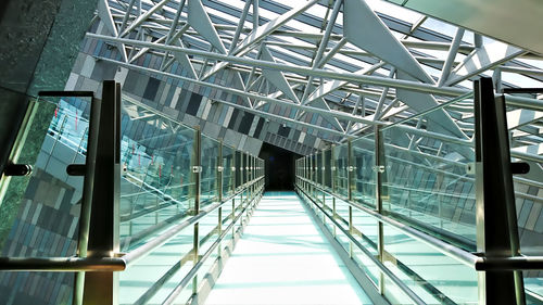 Lanyang museum, yilan, taiwan - aug 13, 2017 - modern glass and steel bridge under a glass roof