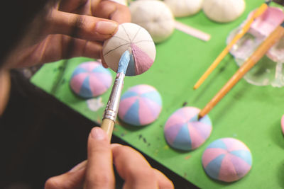 Close-up of hand holding ball