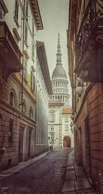 Narrow alley along buildings