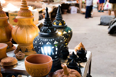 Various clay containers for sale at market stall