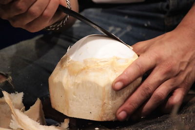 Close-up of person preparing food