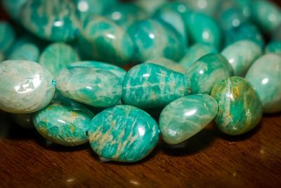 Close-up of pebbles on table