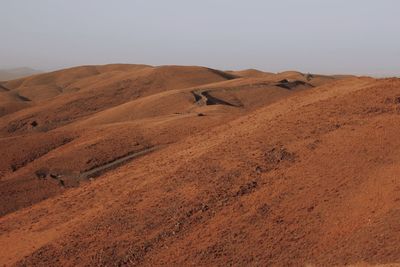 Scenic view of desert against sky