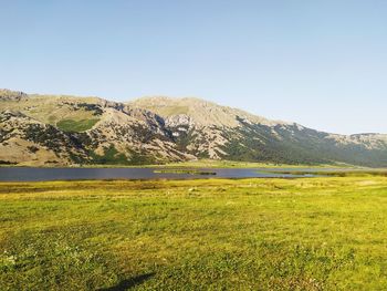 Scenic view of lake against clear sky