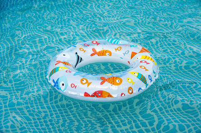 High angle view of inflatable ring in swimming pool