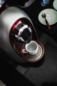 High angle view of coffee cup on table