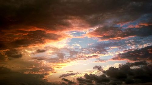 Low angle view of dramatic sky during sunset