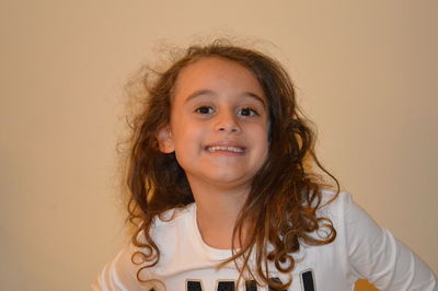 Close-up portrait of smiling girl