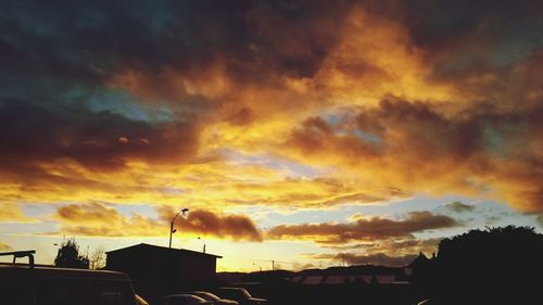 Low angle view of cloudy sky at sunset