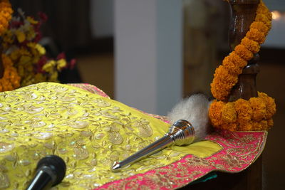 Close-up of yellow roses on table