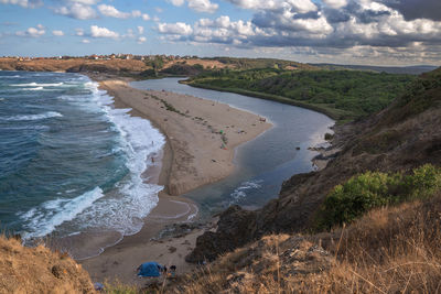 Scenic view of beach against sky